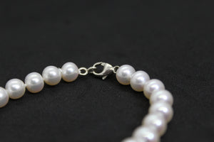 Bracelet PITATÉ avec perles blanches